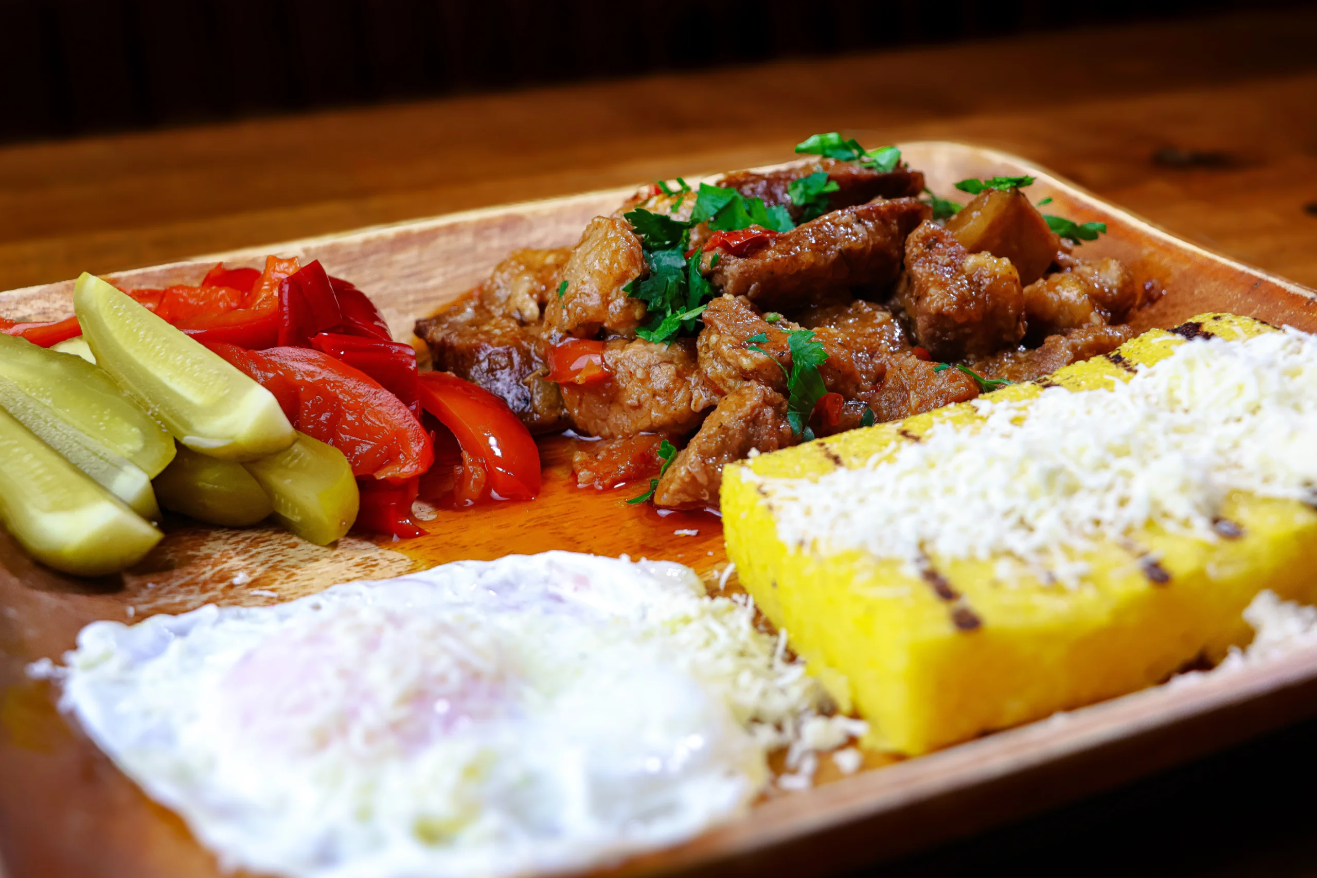 Pork stew with polenta and egg